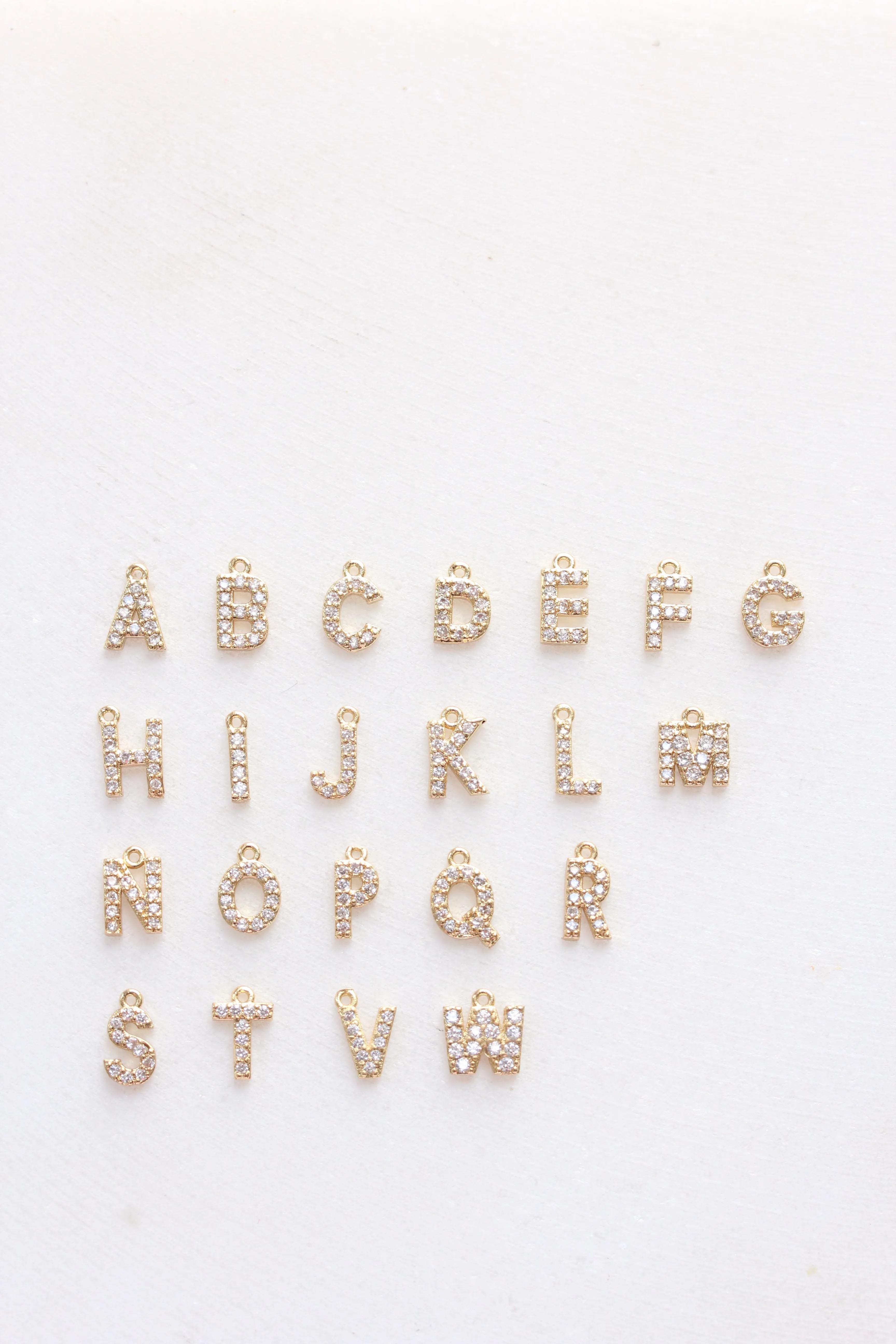 letter charm   birthstone { silver   gold }