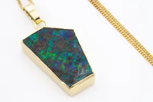 Opal pendant in 14 carat gold and silver.