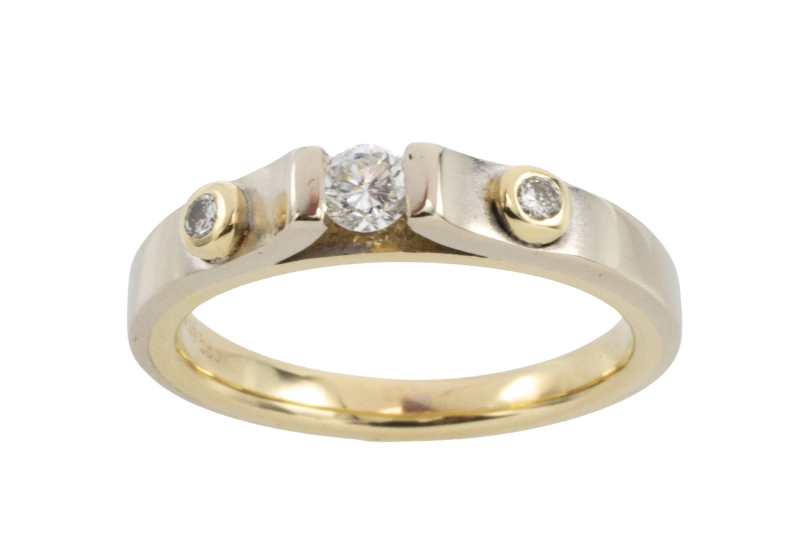 Yellow and white gold three stone diamond ring