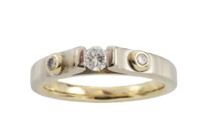 Yellow and white gold three stone diamond ring